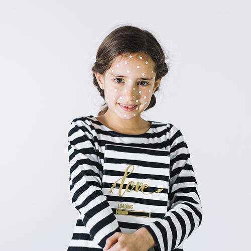 smiling-girl-with-rash-and-notebook.jpg